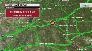 Traffic slowed after FedEx tractor-trailer crashes off I-84 in Tolland