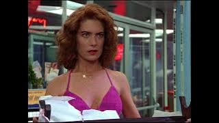 Lara Flynn Boyle with Cat-like blue eyes