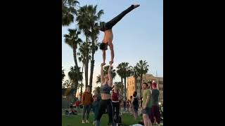 Acrobatic lifts by a Strong girl