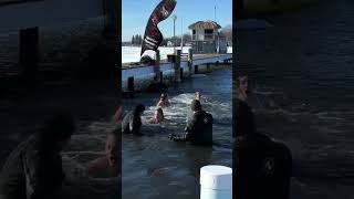 Watch as hundreds dive into Clark Lake for the 2025 Polar Plunge