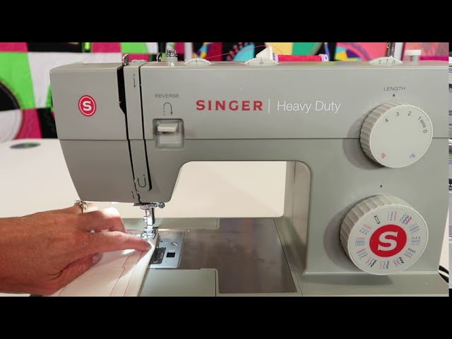 Singer heavy duty (4452): the thread doesn't catch with the needle