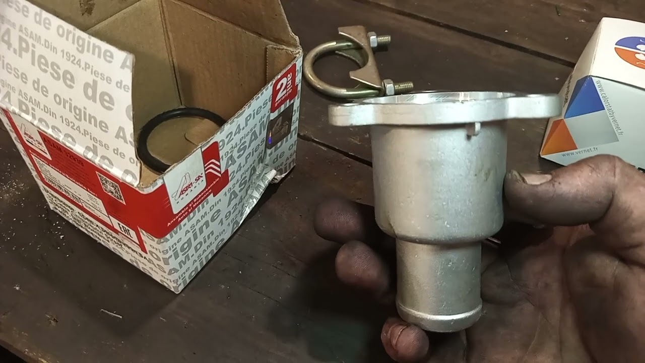 Замена корпуса термостата (термостата) на Рено Логан/ Сандеро 1.4