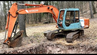 Excavator and driveway maintenance