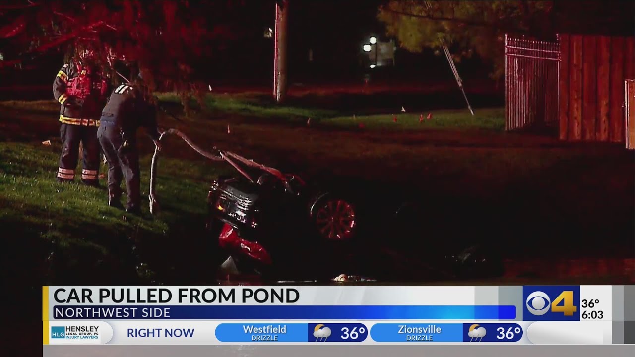 Driver rescued after car plunges into northwest side pond - YouTube