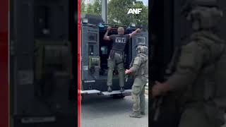 Sandy Springs police investigate man in military gear near polling location