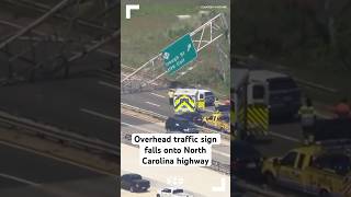 Overhead traffic sign falls onto North Carolina highway