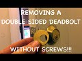 Removing a double keyed deadbolt without screws