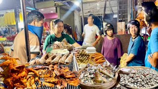 Cambodian street food - Street food at night with pork, chicken, duck, fish, oysters, seafood & more