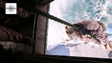 U.S. Marines Fast-Rope Down a Single Point Hatch of a CH-53E Super Stallion