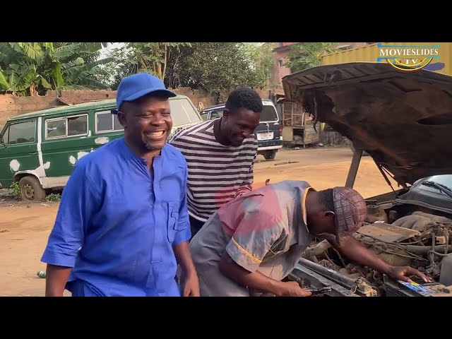 Saliu Gbolagade Ogboluke in Action as Mechanic in movie set class=