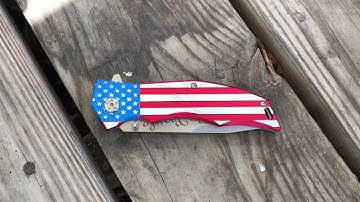 We The People Knife with Etched Blade and  American Flag Handle.