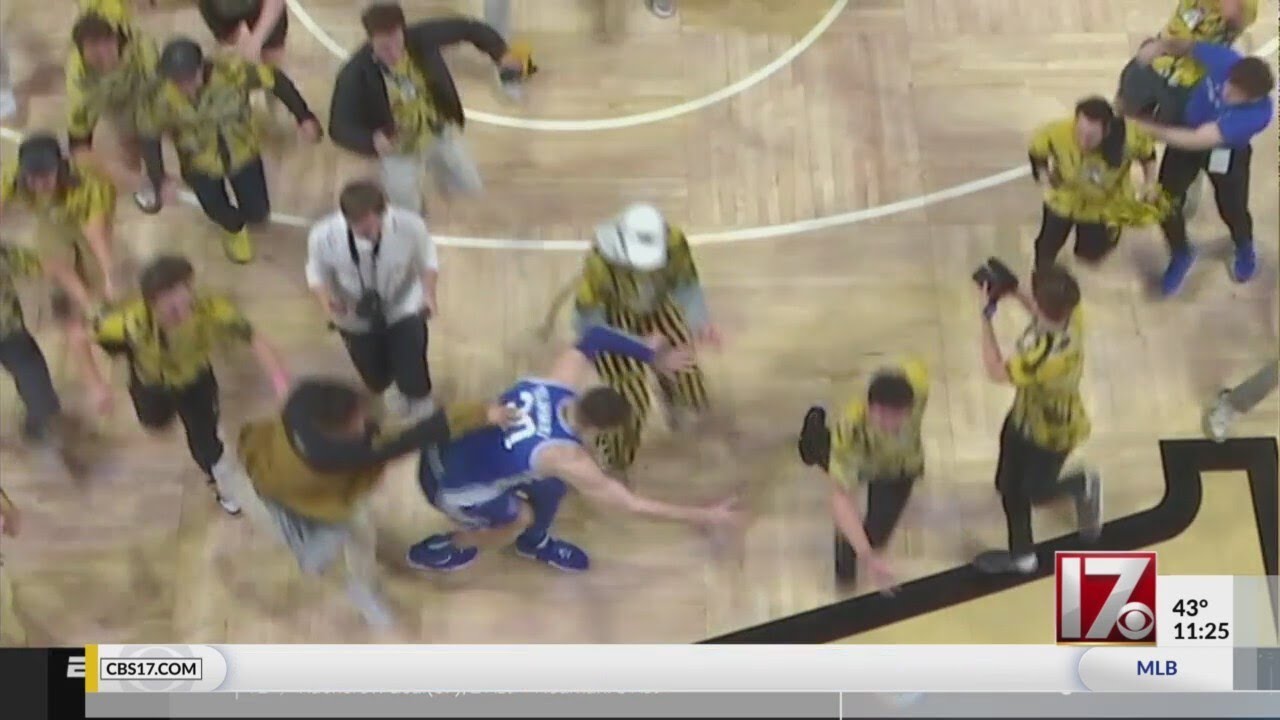 VIDEO Duke player Filipowski knocked around as Wake Forest fans storm court