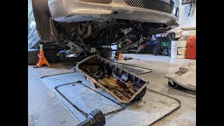 BMW E46 ZHP oil pan gasket, oil pump nut safety wire, and front subframe reinforcement