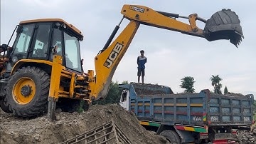 Gravel Being Loaded Into Tripper Dump By Backhoe Loader 2025 @droneplanet2040