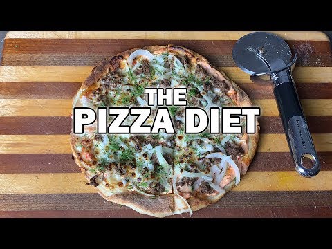 Mediterranean-inspired protein pizza on naan-style dough, from the video