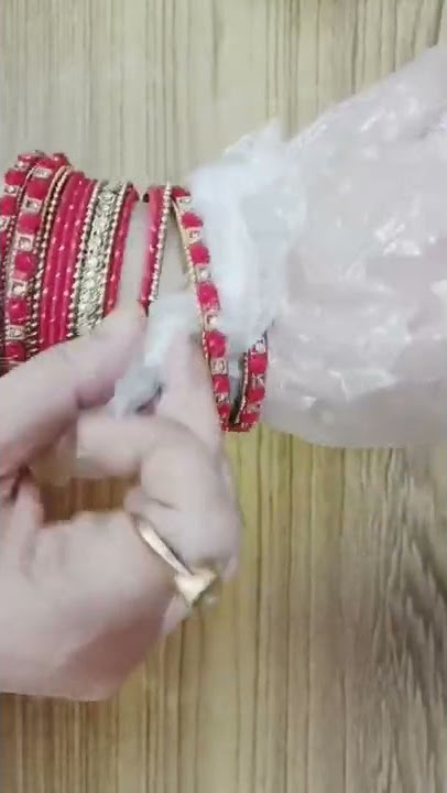 The Secret to Fitting a Small Bangle Over a Wide Hand – Between