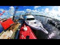 Moving a 52' Hatteras with Engine Failure, Tied up to Barge, and Moving into Pirates Cove Marina