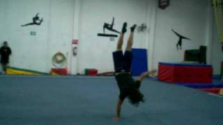 Front flip to rollback one handed handstand