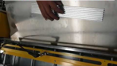 Semi automatic fin inserting machine for intercooler flat tube finning