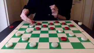 Checkers traps aplenty in the Cross opening (914 exchange variation)