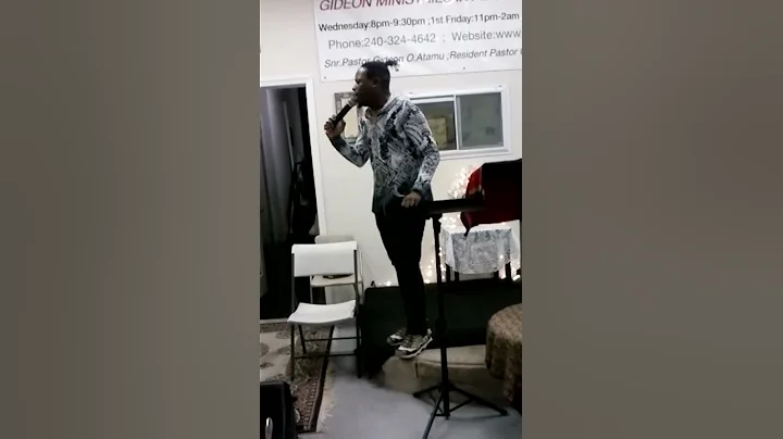 Pastor Morris Graham singing