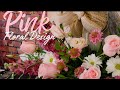 Designing a church arrangement with pretty pink flowers