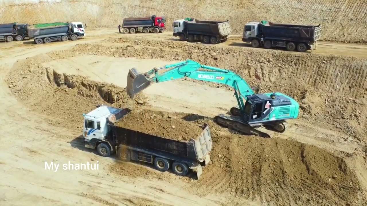 Work for me in the yard between the excavator and the dump truck.