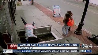 Woman Falls While Texting And Walking