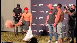 Henry Cejudo kicks TJ Dillashaw, Dominick Cruz pillows during UFC 249 face off