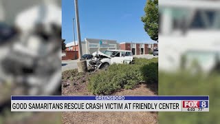 Full Good Samaritans rescue crash victim in Greensboro at Friendly Center Update