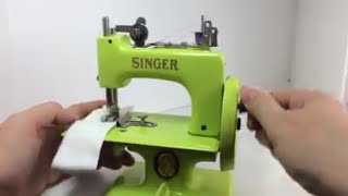 SOLO HILO ! esta bella maquina de coser mini -