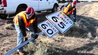 Installing new speed signs
