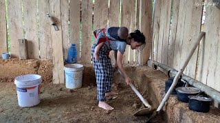 Ly Thi Yen dismantled the earthen stove made by the village chief because it was broken.