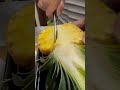 Cutting pineapple