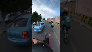 Person Falls off a Bike After Colliding With a Motorcyclist