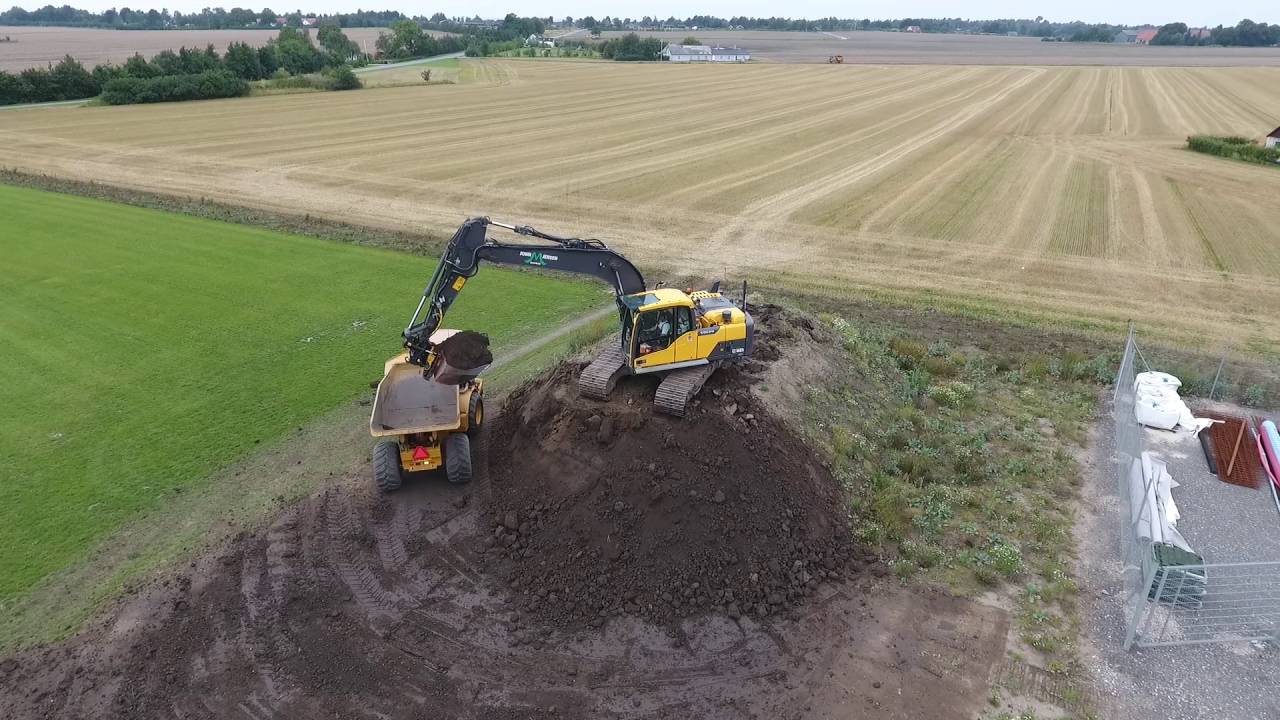 VOLVO EC160 and HYDREMA 912D moving dirt from above [Phantom 4]