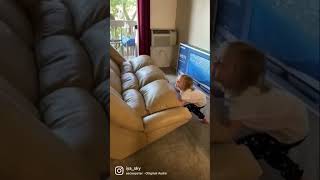 Super strong baby lifting a couch