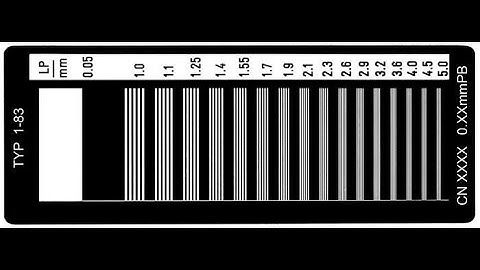 Spatial resolution line pairs test tool and magnification factor