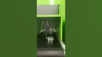 Robot Placing Part on Conveyor Belt