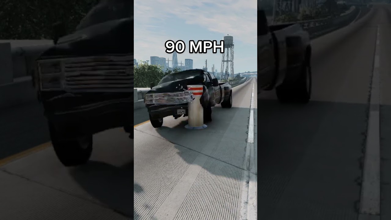 Big black truck hits pole. 