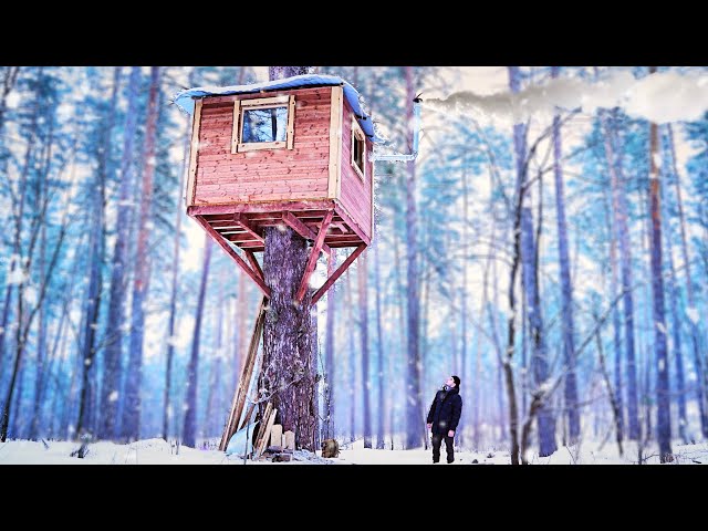 TREE HOUSE LIFE | cozy winter overnight in a tree house with a stove and electricity class=