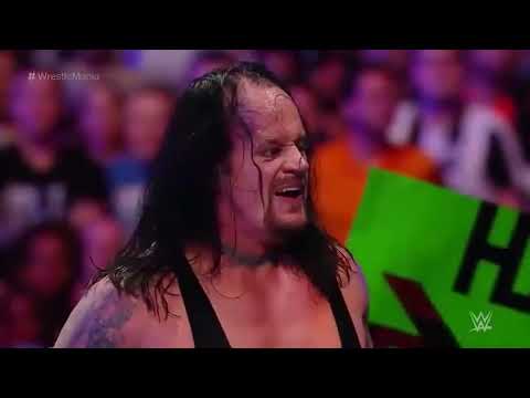 Roman Reigns Spears to Undertaker