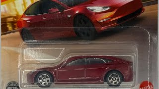 MATCHBOX TESLA - MODEL 3 VEHICLE IN RED FROM 2024