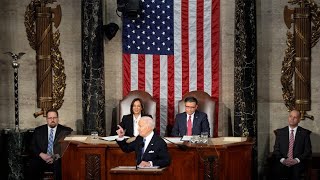 Biden signs a package of spending bills passed by Congress just hours before a shutdown