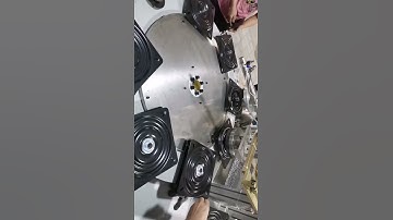 Automatic lazy suzan castor assembly machine