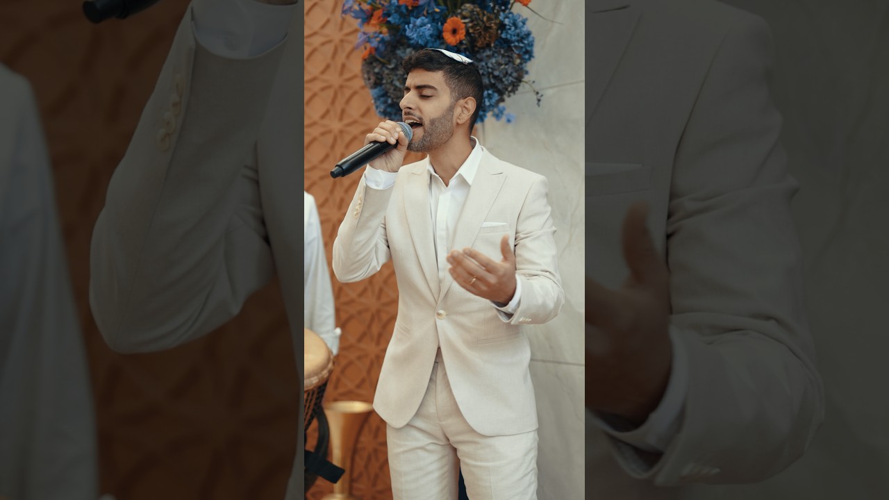 Evyatar Tzadok sings Mi Sheberach during the opening of the Holy Ark