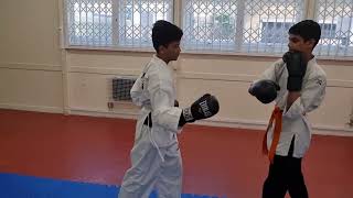Uchi Uke (inside to outside hooking block) and Ura Ken (backfist) drill