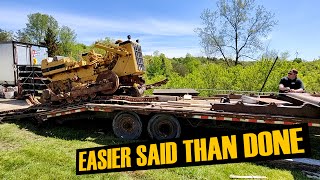 Unloading a Trackless Bulldozer