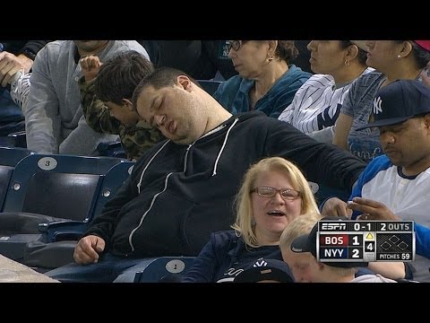 Fan sleeps in stands during game vs. Red Sox