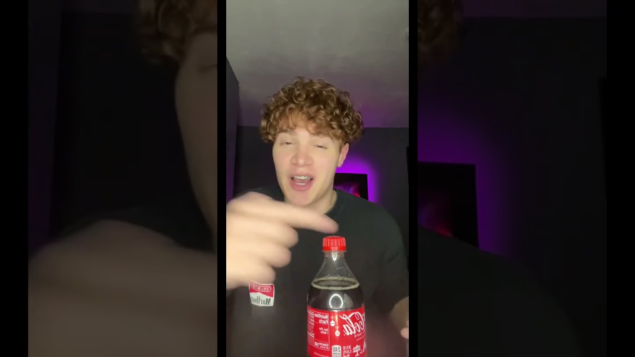 INFLATING A BALLOON WITH COKE AND MENTOS 